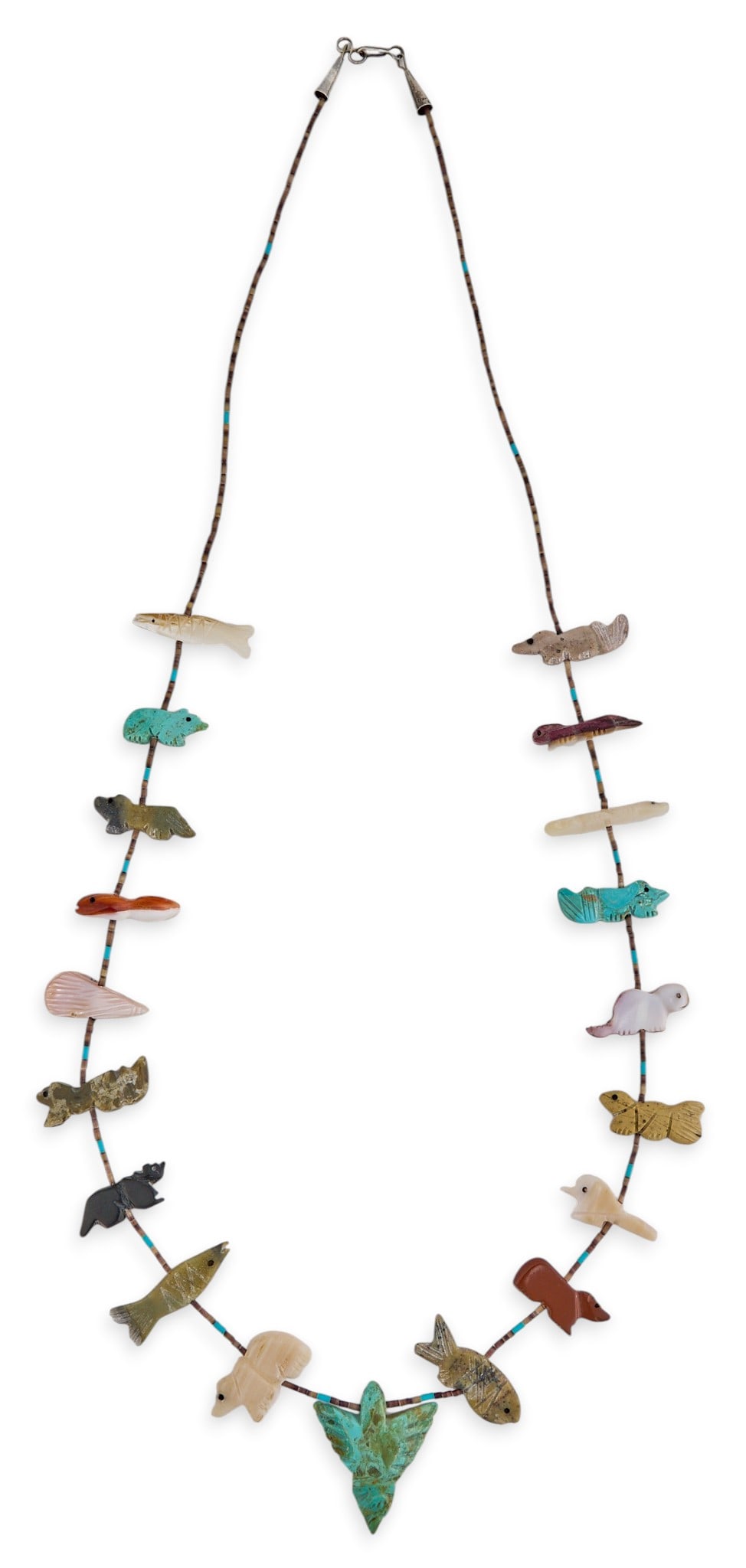 Beaded Fetish Necklace: Beaded fetish necklace, featuring various carved stones, with hook and eye closure Length: 31 in. Total weight: 38.3 g Provenance: Property from a home in San Antonio, Texas