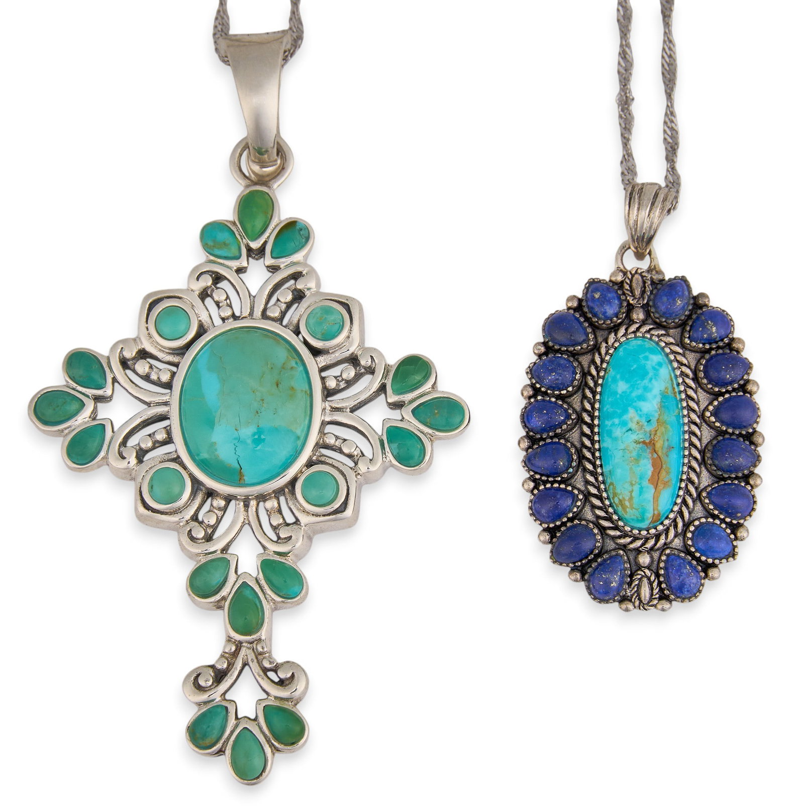 (2) Sterling Silver and Turquoise Pendant Necklaces: Two sterling silver pendant necklaces, one set with single turquoise cabochon and lapis halo, and a cross motif pendant set with Kingman turquoise, both on sterling silver chains, and
