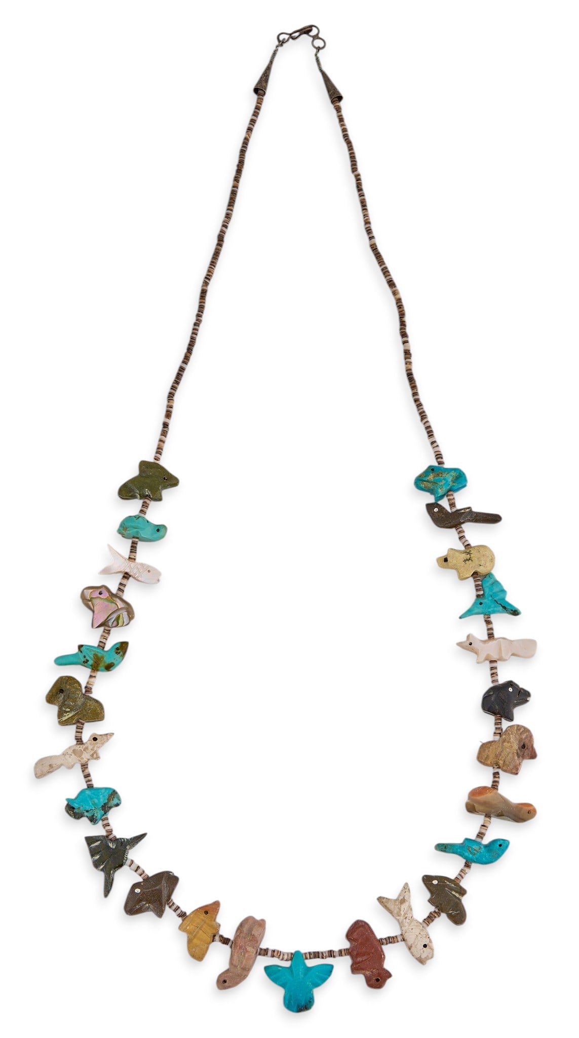 Multi-Stone Beaded Fetish Necklace: Multi-stone beaded fetish necklace with hook and eye closure Length: 27 in. Total weight: 44.6 g Provenance: Property from the