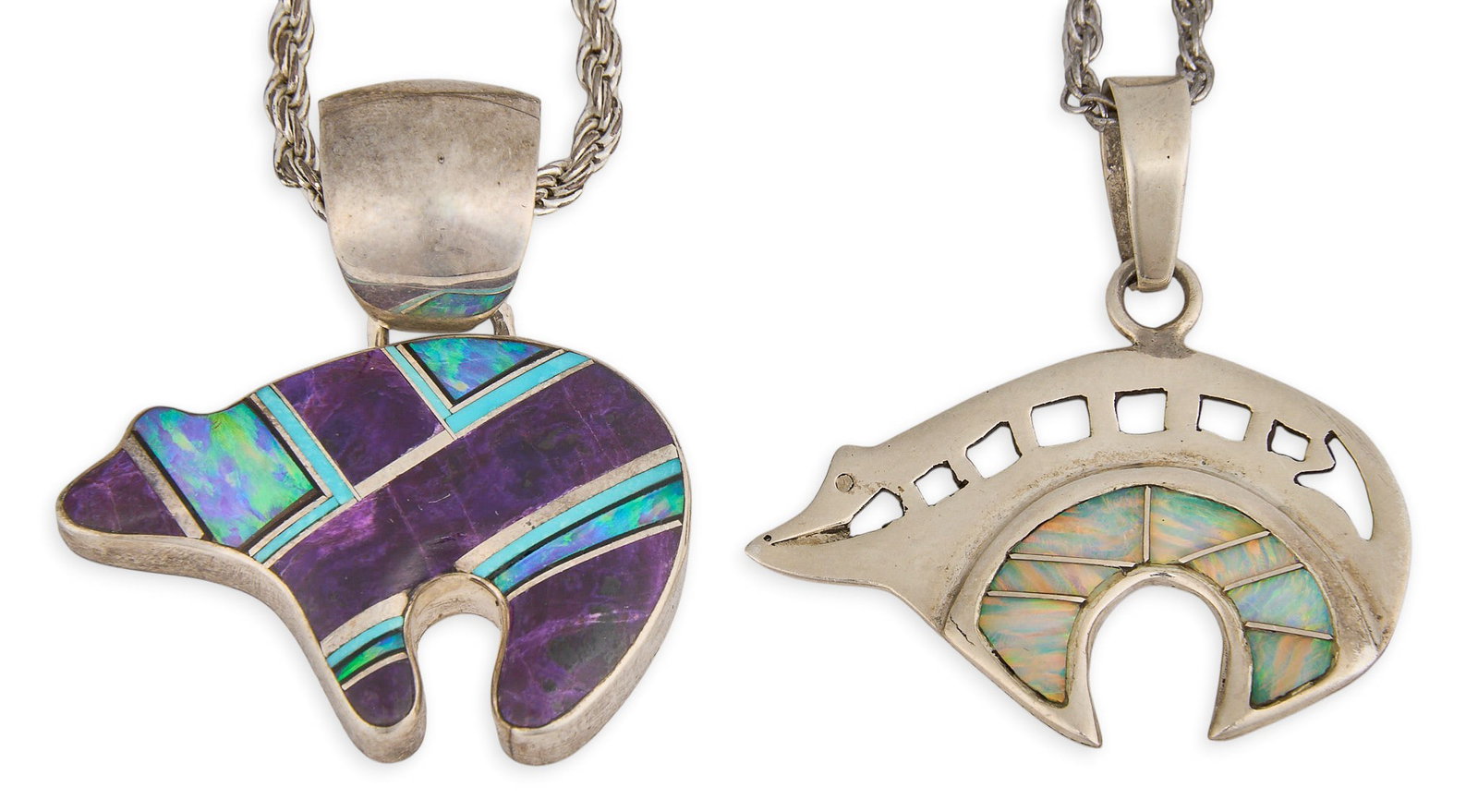 (2) Sterling & Multi-Stone Bear Pendant Necklaces: Two sterling silver bear motif pendant necklaces, set with multi-stone inlay, on sterling silver chains, marked Length: 20 in. / each Total weight: 32.7 g Provenance: Property from a home in San Anton