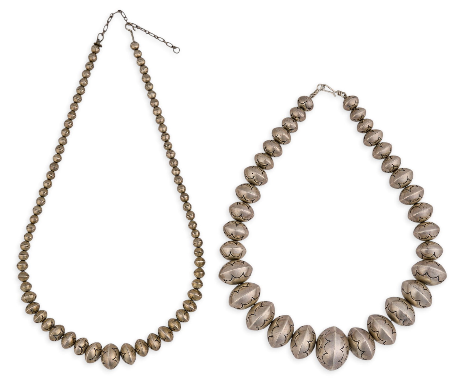 (2) Sterling Silver Navajo Pearl Necklaces: Two sterling silver Navajo pearl necklaces, with hand-stamped details throughout, both with hook and eye closures Length: 22.5 in. / longest Total weight: 175.6 g