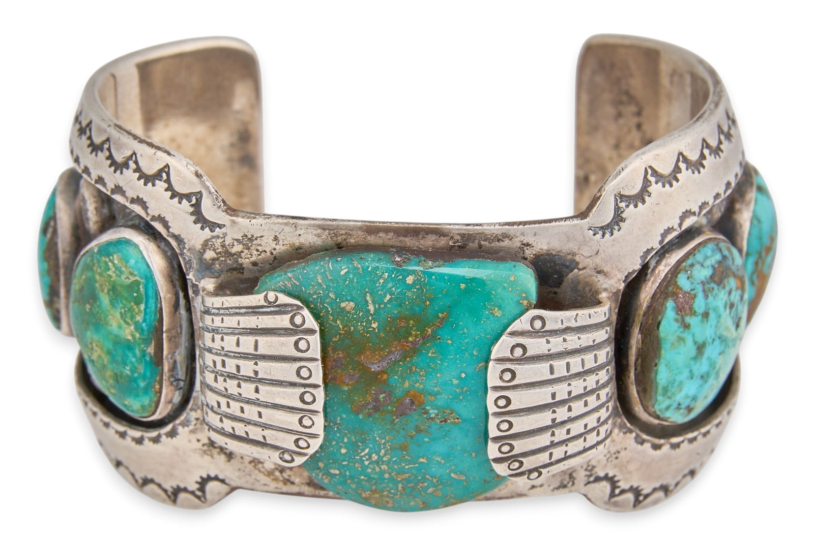 Sterling & Turquoise Cuff Bracelet: Sterling silver cuff bracelet converted from wrist watch, set with seven turquoise stones, signed "KBL" Circumference: 7 in. Total weight: 121.6 g Provenance: Property from a home