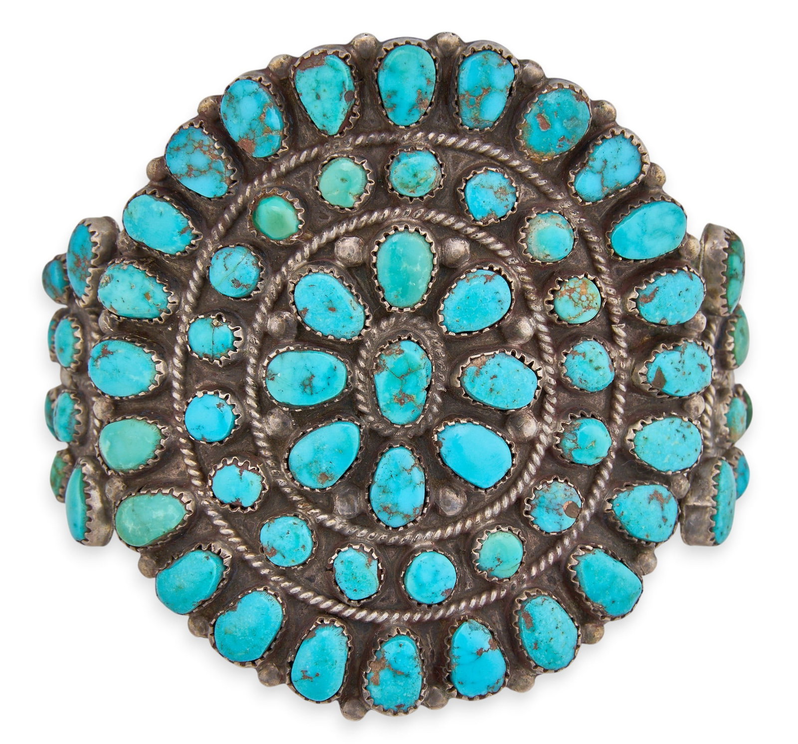 Zuni Sterling & Turquoise Cluster Cuff: Zuni sterling silver cuff bracelet, set with turquoise cabochons in cluster design Circumference: 6.5 in. Total weight: 71.5 g