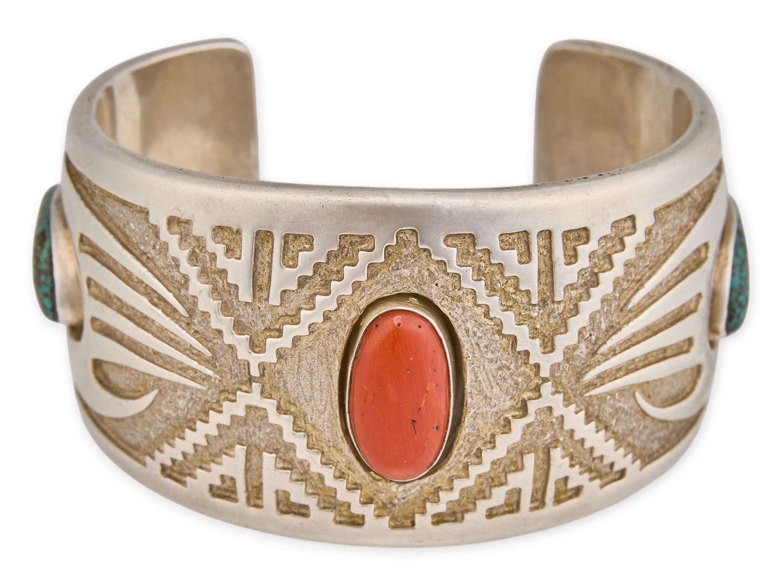 Tufa Sterling & Multi-Stone Cuff: Navajo Tufa sterling silver cuff bracelet set with multiple stones, signed "JACKSON" Circumference: 6.5 in. Total weight: 118.7 g Provenance: Property from a home in San Antonio, Texas