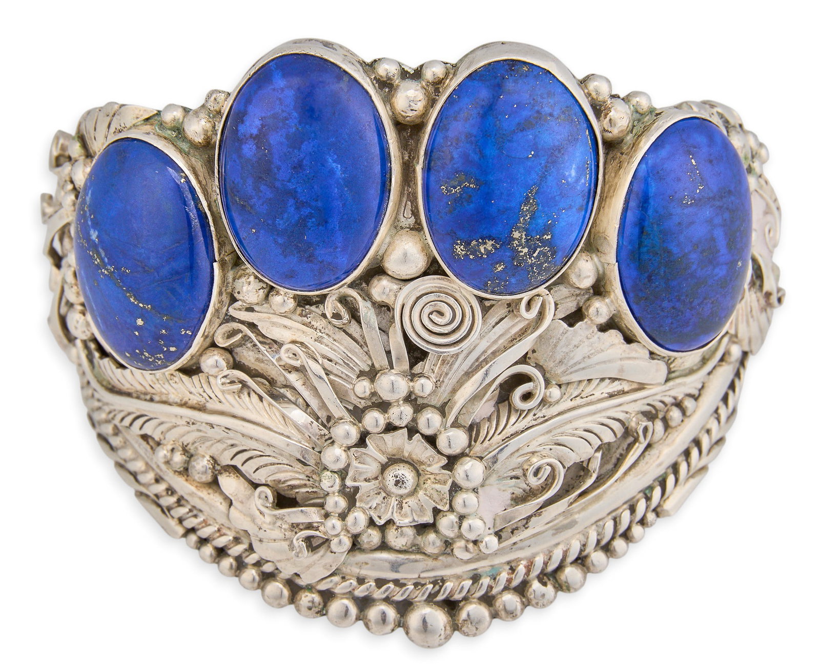 Sterling Silver & Lapis Cuff: Sterling silver cuff bracelet set with lapis stones, signed "E. Kee" Circumference: 7.5 in. Total weight: 113.9 g Provenance: Property from a home in San Antonio, Texas