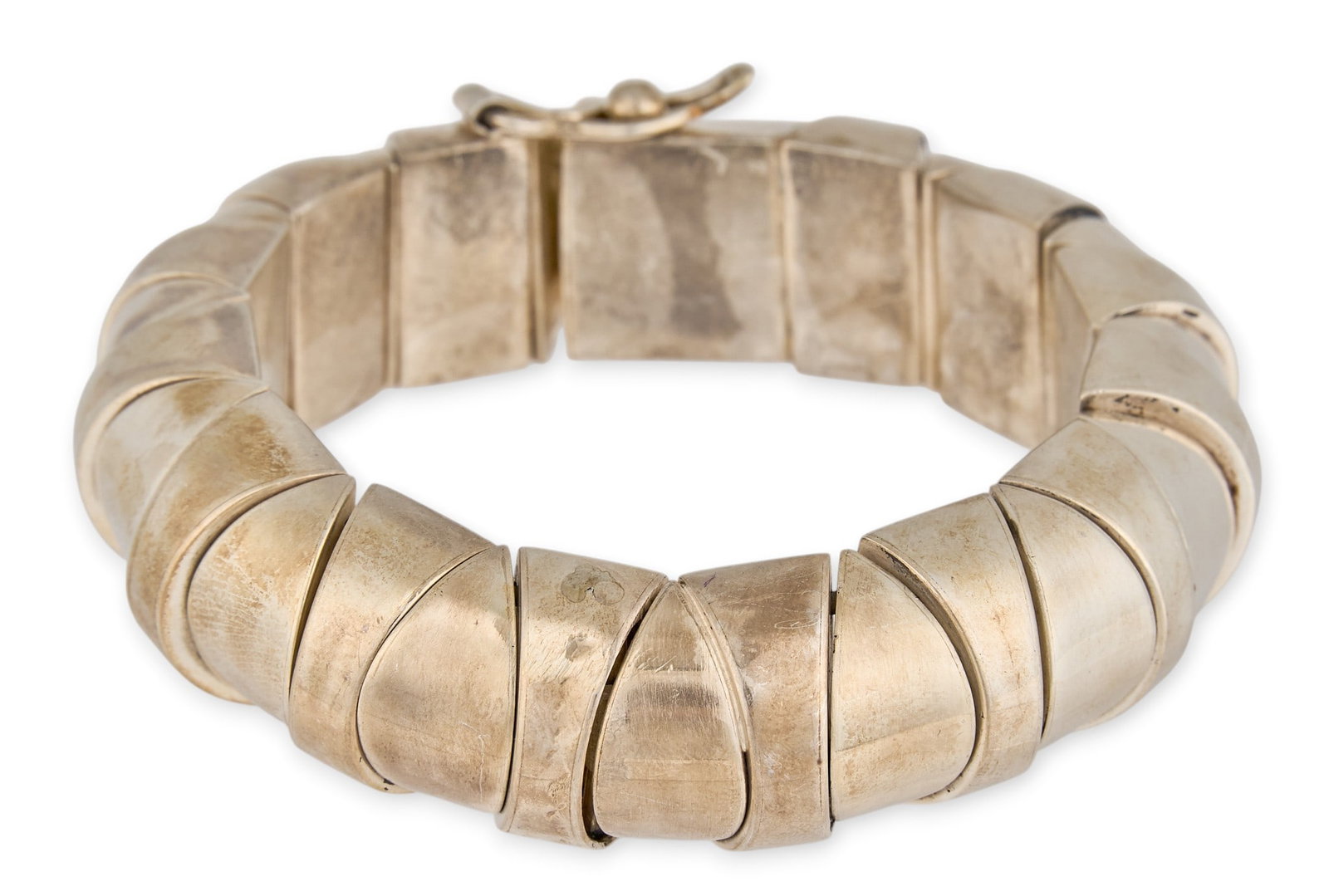 Mexican Sterling Silver Cuff: Mexican sterling silver cuff bracelet, marked "Mexico 925" Circumference: 7.5 in. Total weight: 135.3 g Provenance: P