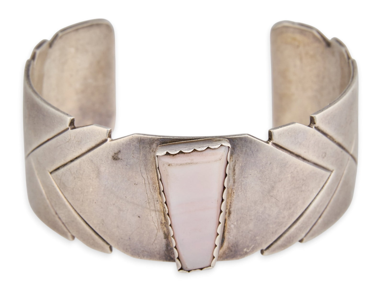 Sterling & Pink Mussel Cuff Bracelet: Marked sterling silver cuff bracelet set with pink mussel stone, signed B.J. Guerro Circumference: 6.5 in. Total weight: 49.61 g Provenance: Property from a home in San Antonio, Texas