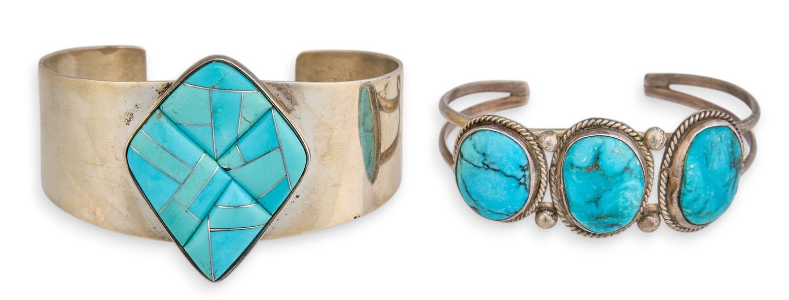 (2) Sterling & Turquoise Cuffs: Two sterling silver cuff bracelets, one set with three turquoise cabochons and twisted rope details, and one featuring turquoise inlay in geometric design, marked "DTR .925" Circumference: 7