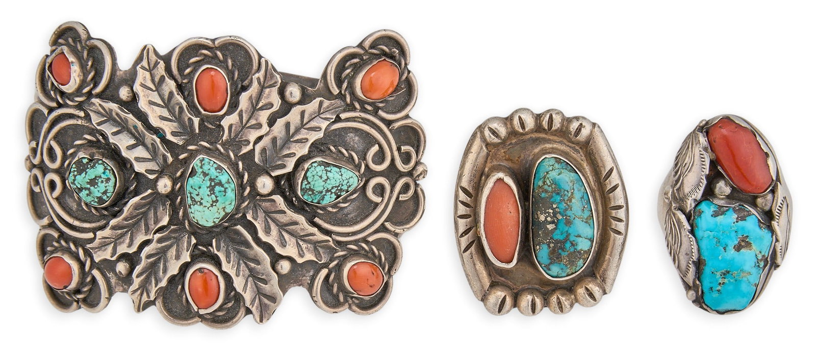 (2) Sterling Silver Turquoise & Coral Rings and Cuff: Two Southwestern sterling silver rings, each set with turquoise and coral stones, with stamped details and feather motifs, and one cuff set with turquoise and coral cabochons, featuring leaf motifs,&n