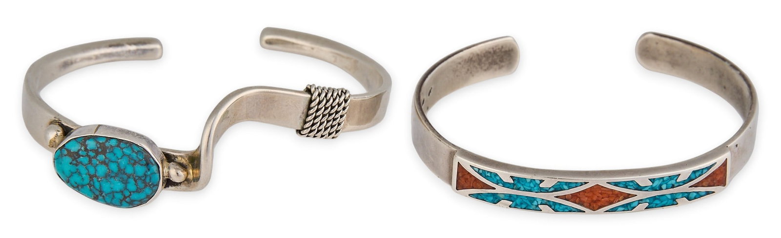 (2) Sterling Silver & Turquoise Cuffs: Two marked sterling silver cuffs with turquoise inlay Circumference: 6.25 in. / each Total weight: 39.34 g Provenance: Property from a home in San Antonio, Texas 
