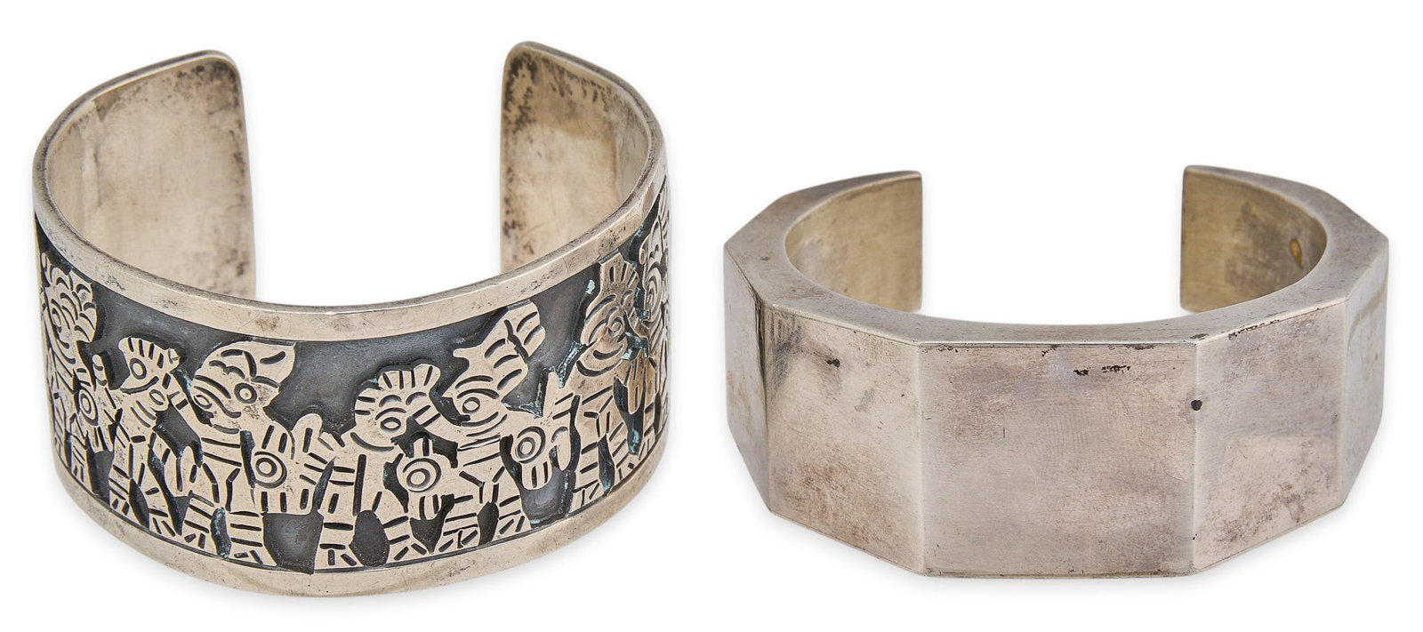 (2) Mexican Sterling Silver Cuffs: Two Mexican sterling silver cuffs, depicting figural motifs and geometric design, both marked "Sterling" and "Hecho en Mexico" Circumference: 7.25 in. / largest Total weight: