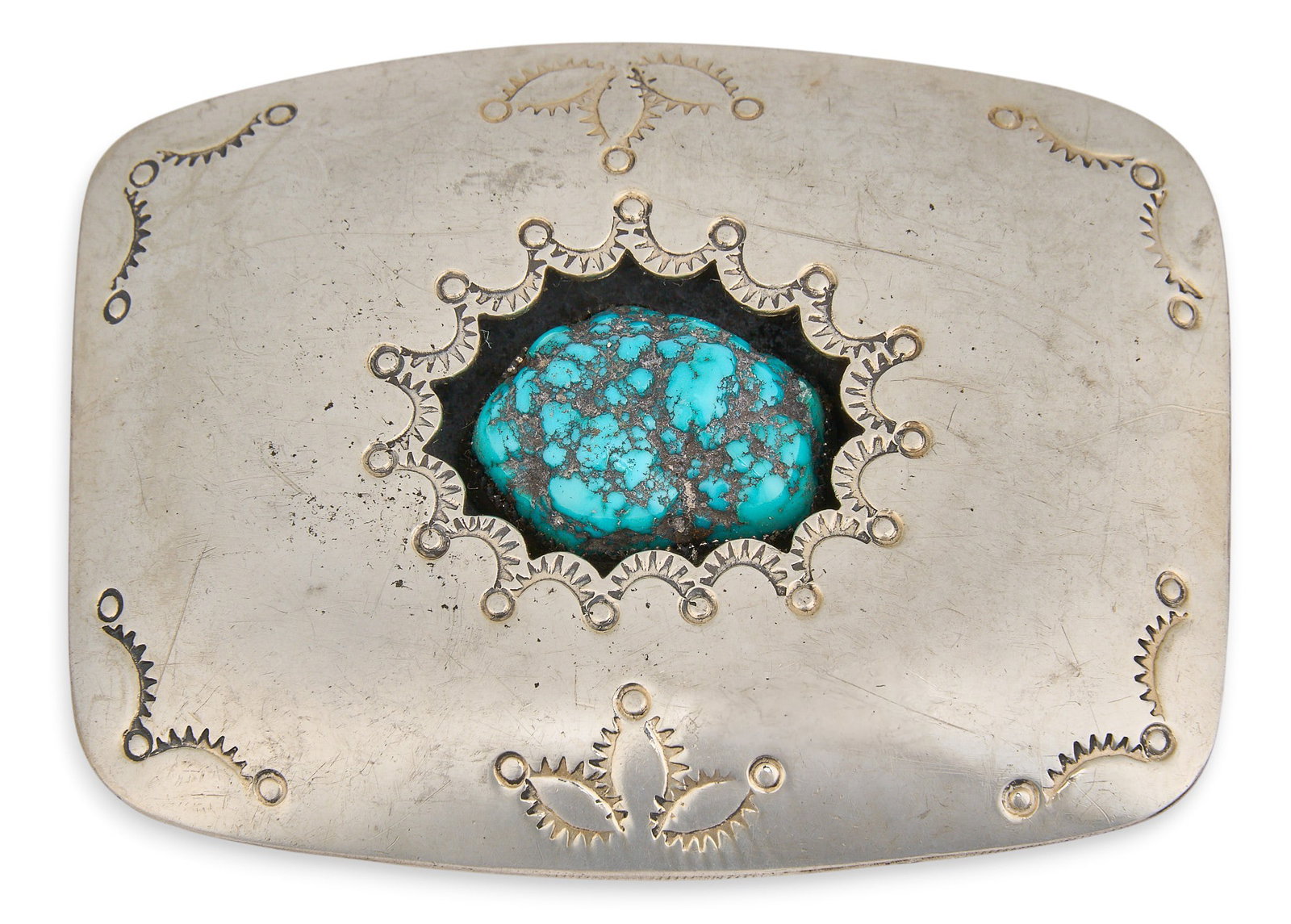 Sterling & Turquoise Shadowbox Style Buckle: Sterling silver buckle set with single turquoise stone in shadowbox style setting, featuring stamped details, marked "WT" Size: 3.25 in. x 2.5 in. Total weight: 84.6 g