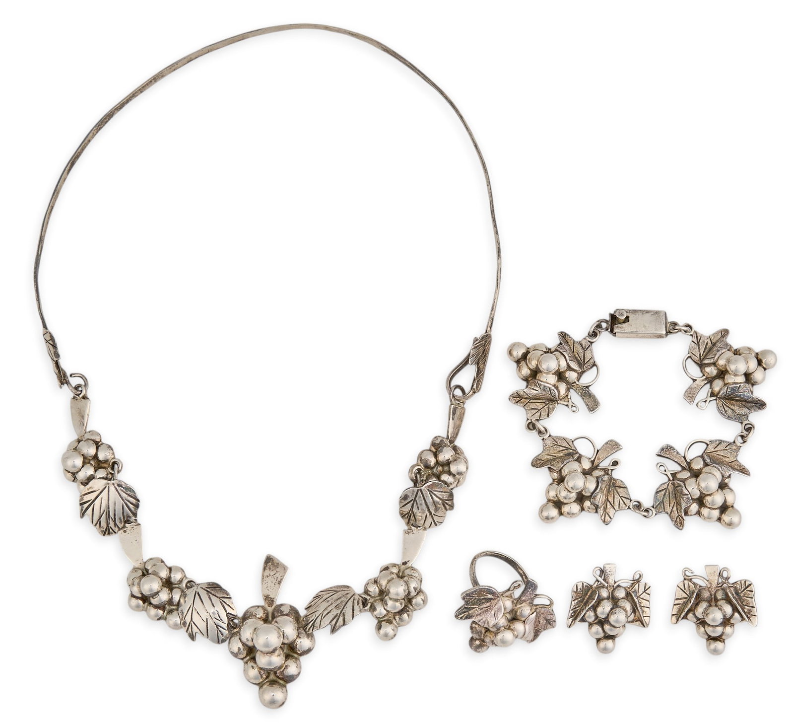 Mexican Sterling Silver Jewelry Suite: Mexican sterling silver jewelry suite to include a necklace, bracelet, pair of earrings, and a ring, featuring grape and leaf motifs throughout, ring size 8.25, all marked "Mexico 925" Neckl