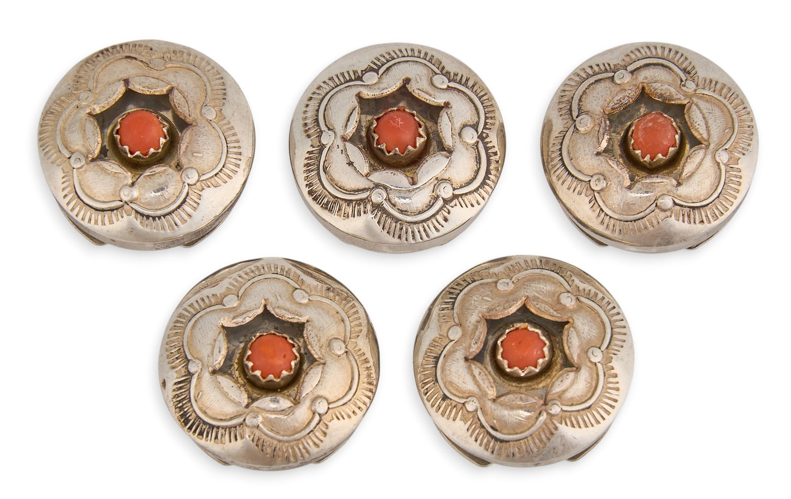 (5) Sterling & Coral Button Covers: Set of five Southwestern sterling silver button covers, each set with small coral cabochon and stamped details Size: 0.75 in. diameter / each Total weight: 15.6 g