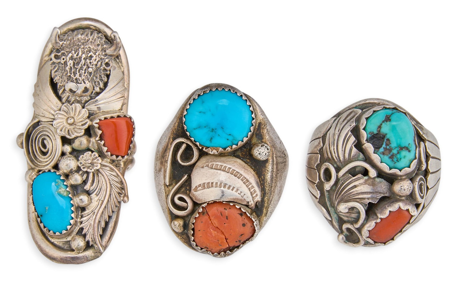 (3) Sterling Silver Turquoise & Coral Rings: Three sterling silver rings, each set with turquoise and coral cabochons, featuring assorted Southwestern motifs, one marked "R.B. 925" Sizes: 8, 9, 10 Total weight: 57.9 g