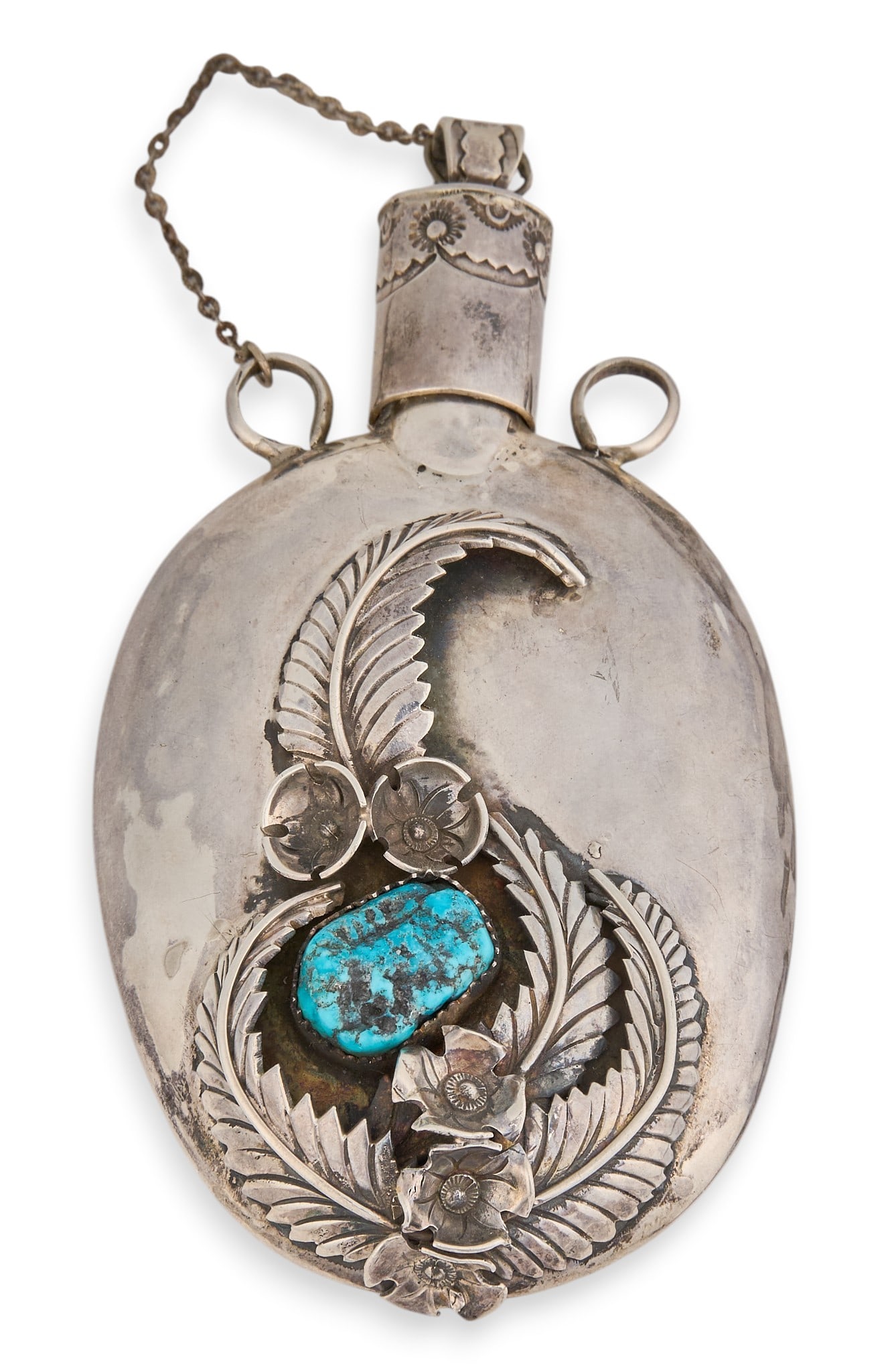 Sterling Silver & Turquoise Flask: Sterling silver flask set with single turquoise stone, featuring feather motifs and hand-stamped details, marked "Geronimo" Size: 4.5 in. x 2.75 in. Total weight: 117.4 g Provenance: Propert
