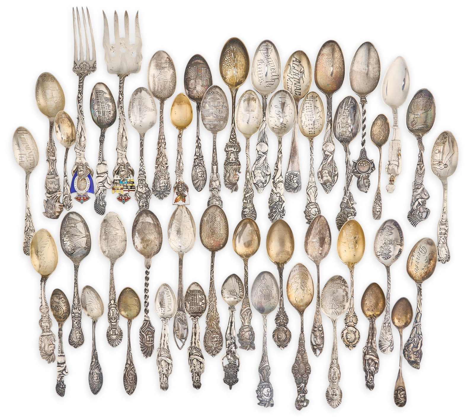(47) Vintage Sterling Souvenir Spoons & Forks, Native American Themes: Collection of 47 vintage sterling silver souvenir spoons and forks from the U.S. and Canada, featuring Native American themes and imagery Total weight: 28.655 ozt Provenance: Property from a home in S