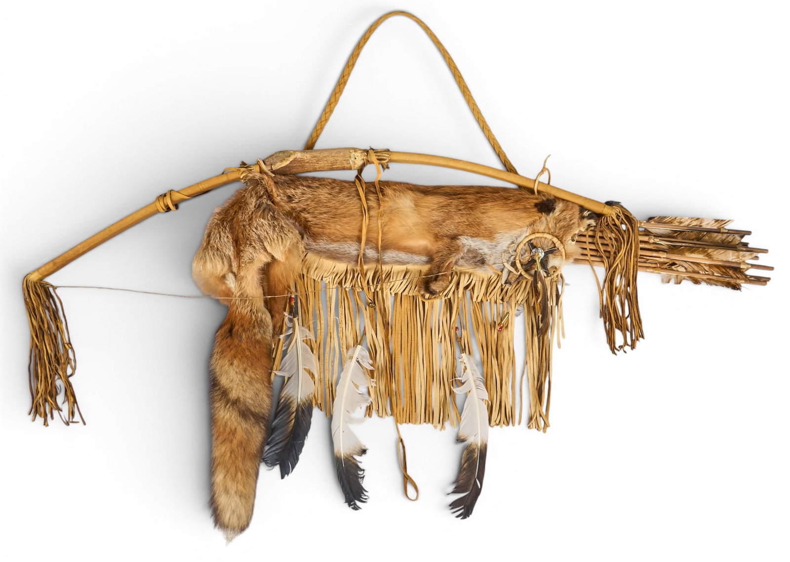 Navajo Red Fox Bow and Quiver: Curtis Bitsui (Diné [Navajo], b. 1950), red fox bow and quiver, handcrafted circa 2003 height 34 in. x width 49 in. x depth 3 in. Provenance: Property from a Wimberley, Texas art and antiq