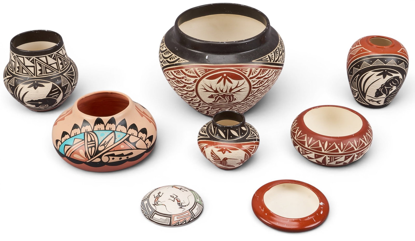 (7) Acoma Pueblo Pottery Vessels: Collection of seven Acoma Pueblo pottery vessels, with painted polychrome motifs, each signed to the bottom height 8 in. x diameter 9 in. / largest Provenance: Property from a home in San Antonio, Tex