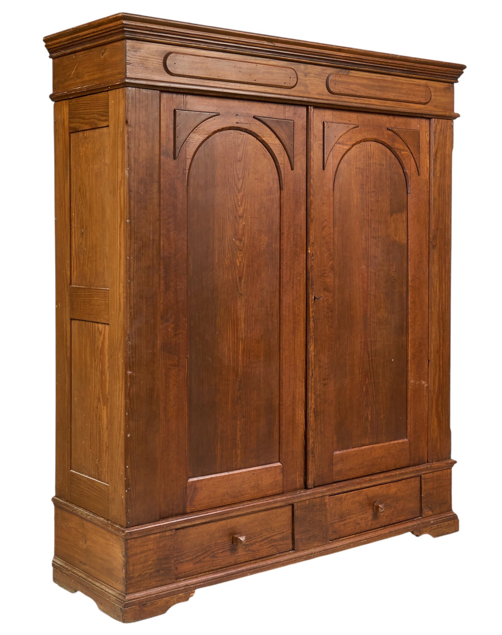 Antique Farmhouse Armoire: Antique farmhouse armoire with decorative top molding, arched panel doors, and two lower drawers height 82 in. x width 69 in. x depth 24 in. Provenance: Property from the Estates