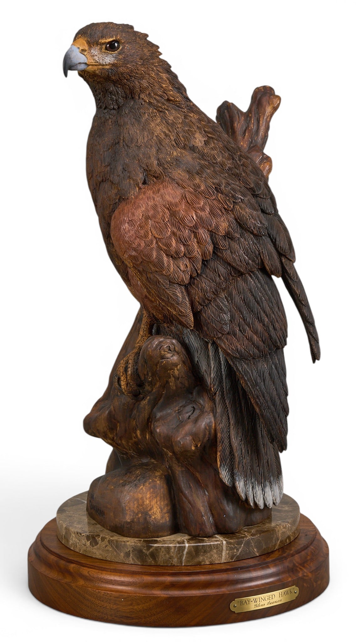 Glenn Swanson, "Bay-Winged Hawk": Glenn Swanson (Amer., b. 1951), "Bay-Winged Hawk", artist-cast bronze sculpture on stone and wooden base, incised signature height 21 in. x width 13 in. x depth 10 in. (including base) Prove
