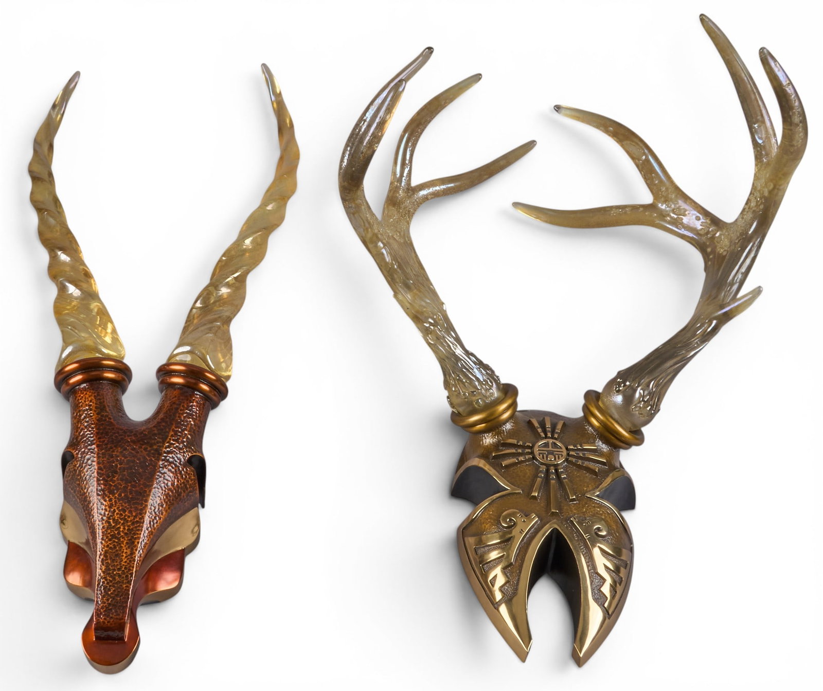 Paul Toudouze, (2) Bronze Sconces: Paul Anthony Toudouze (Texas, 1950-2026), (2) bronze sconces, El Dorado (whitetail) and Soul of the Serengeti (kudu), each with blown glass antlers, wired; skulls are marked