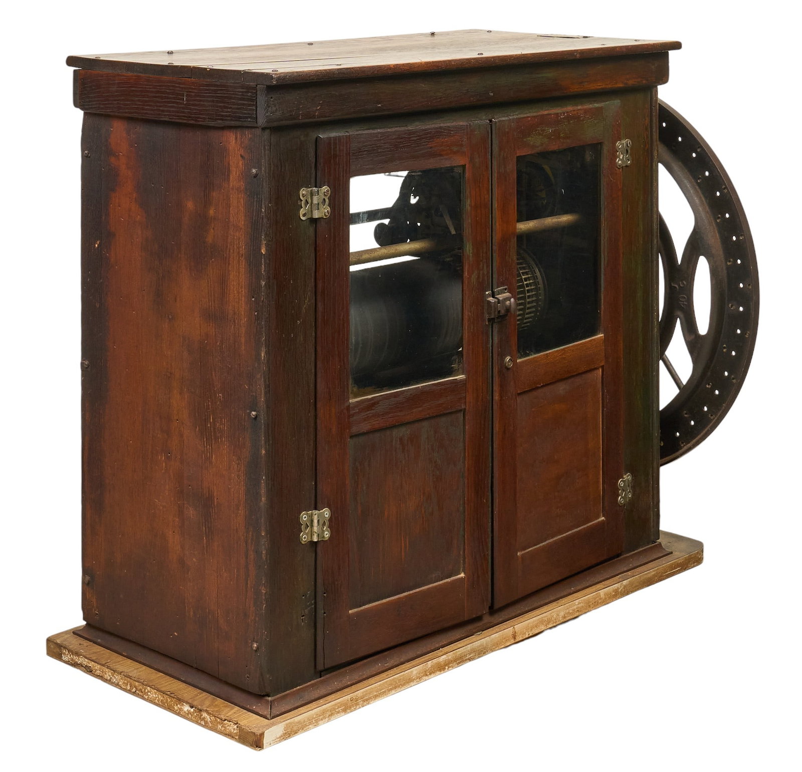 IBM Time Clock, ca. 1910: IBM Time Recording Division, wooden cased time clock, with large wheel on the side and a mechanism visible through glass-paneled doors, includes historical documentation, untested, circa