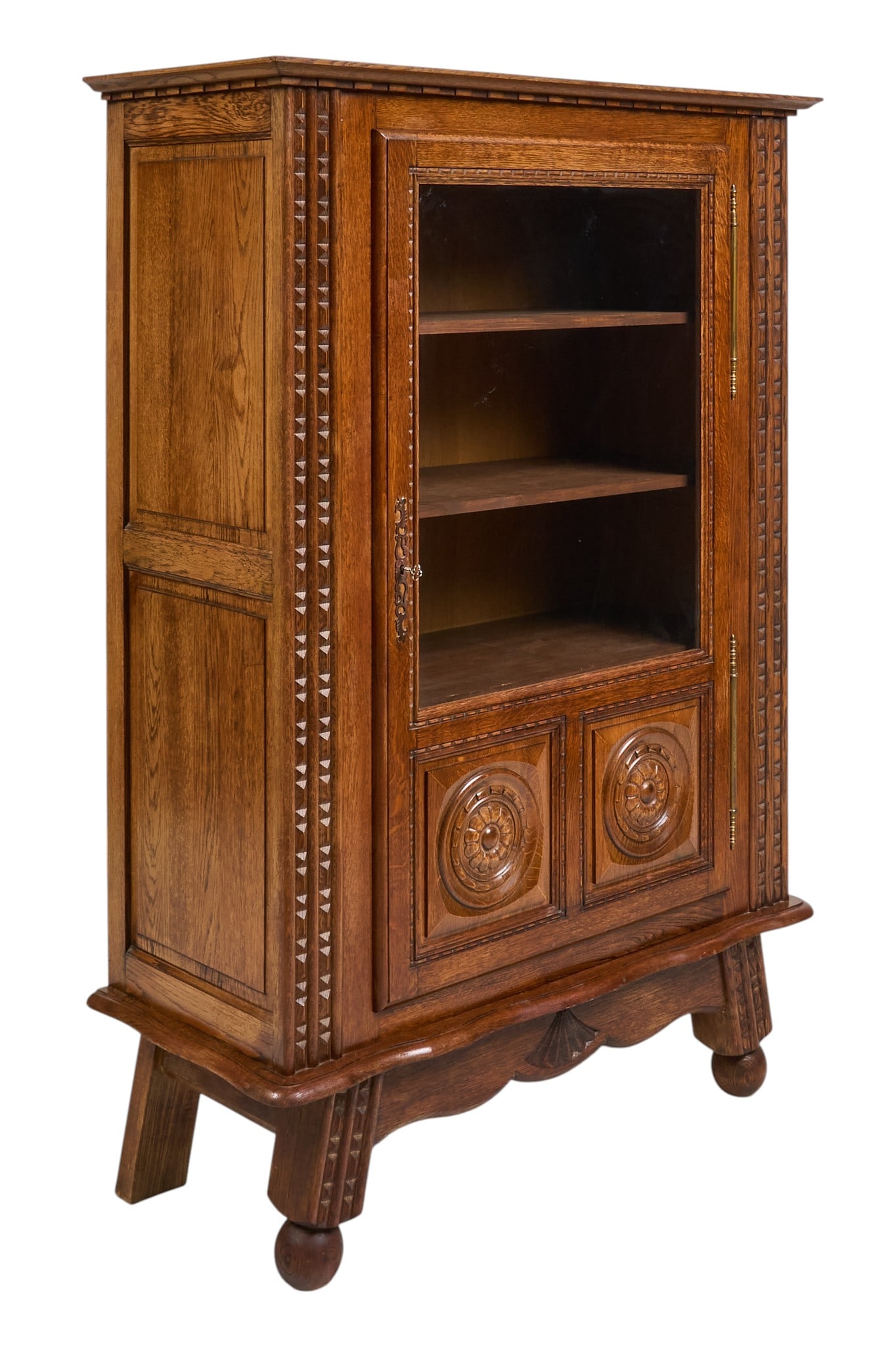 Carved Cabinet: Vintage cabinet with carved glass front door and shelved storage, supported on splayed decorative legs height 65 in. x width 44 in. x depth 19 in. Provenance: Property from a home in San