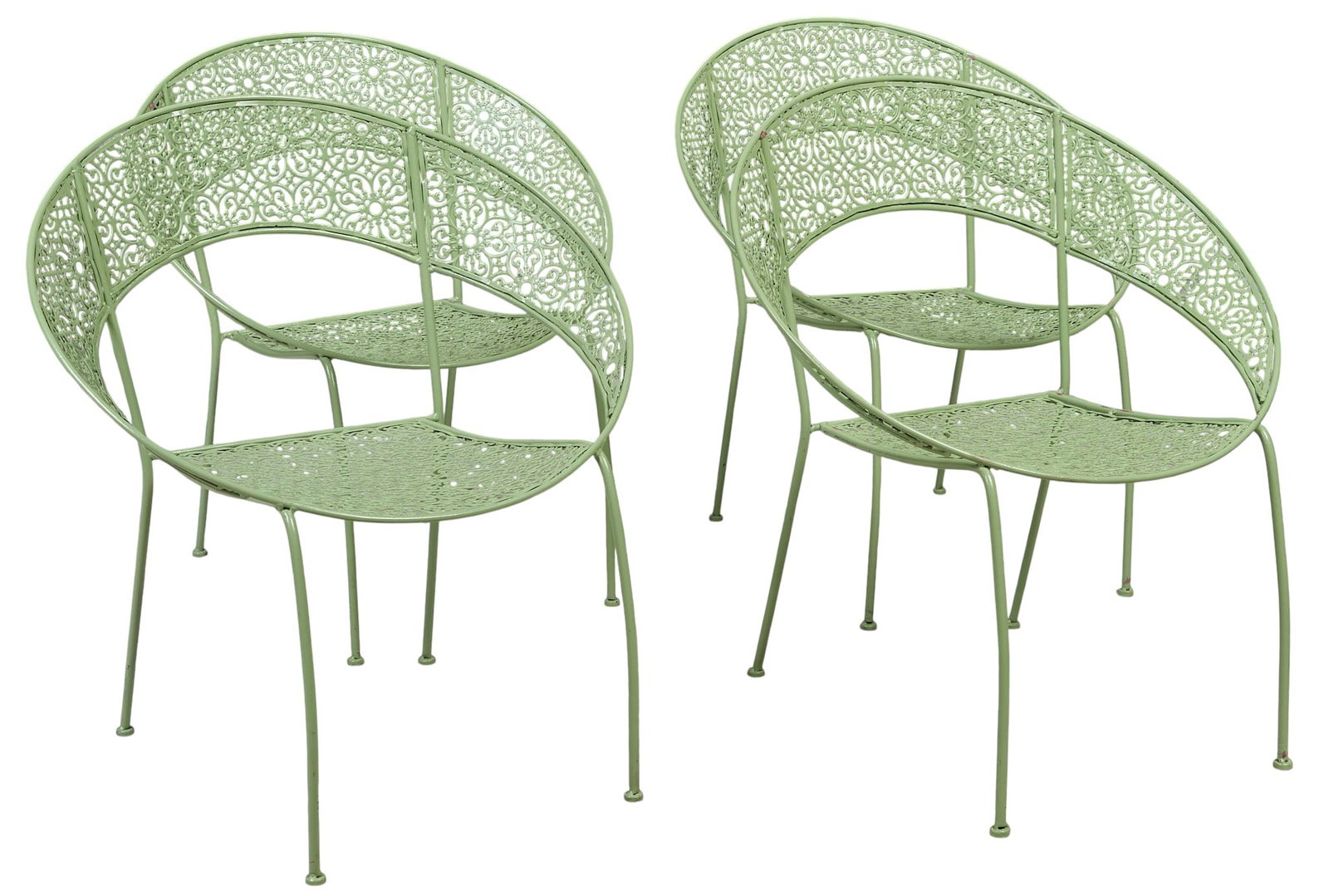 (4) Green Metal Patio Chairs: Set of four matching patio chairs, each with a light green metal construction and intricate cutout pattern on the back and seat, rising on slender legs height 30 in. x width 26.5 in. x