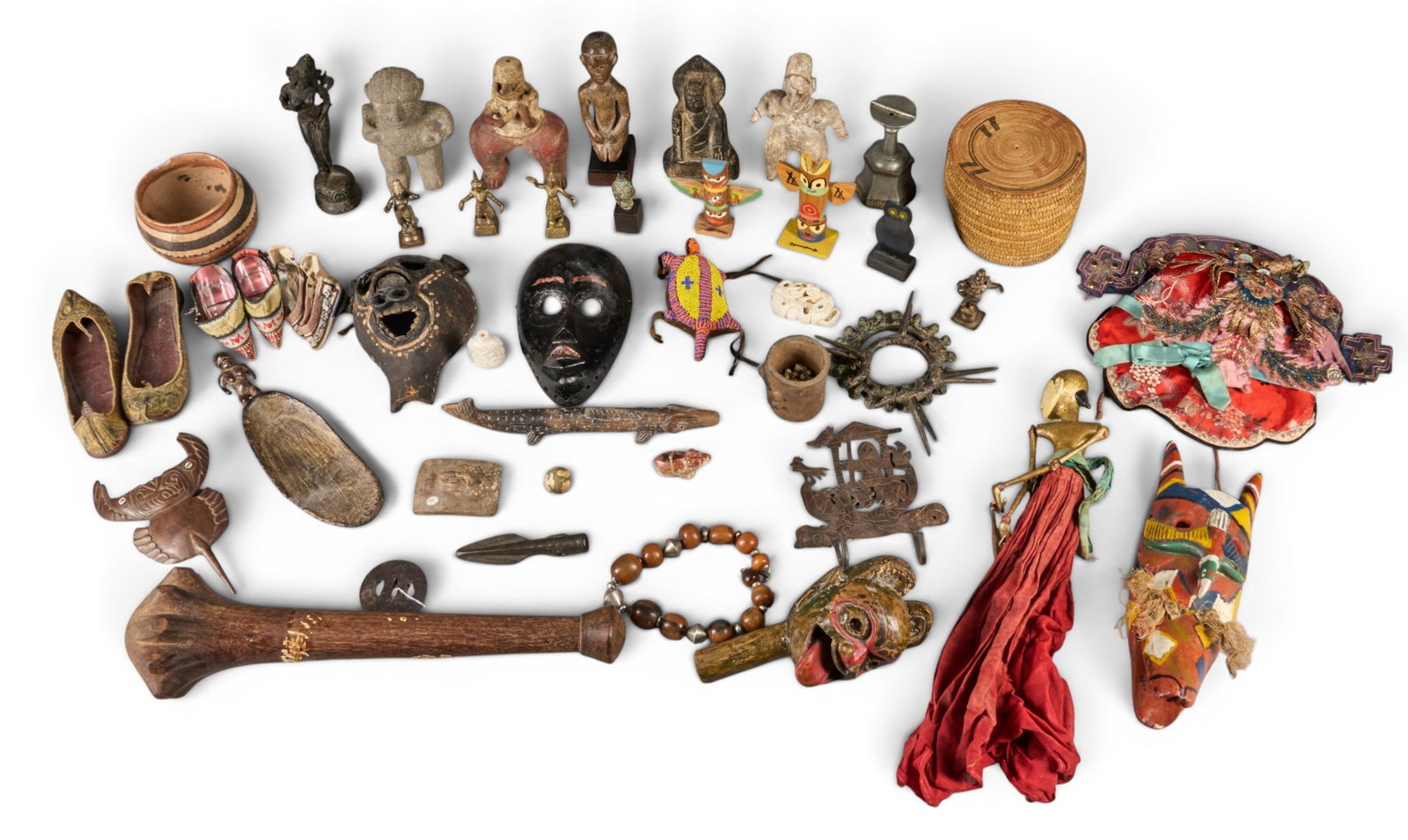 Collection of Tribal Artifacts from Various Cultures: Diverse collection of tribal artifacts from various cultures, includes carvings, masks, figures, pottery, and other ethnographic items height 19 in. x width 6 in. x depth 5 in. / largest Provenance: P