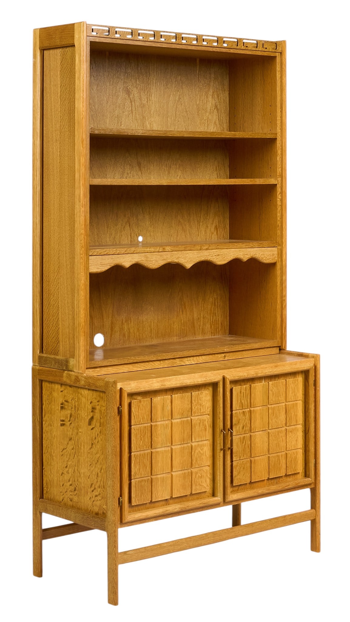 Henning Kjaernulf, Mid-Century Bookcase: Henning Kjaernulf (Denmark) oak mid-century bookcase with adjustable shelves, and lower cabinet, supported on block legs height 73 in. x width 37 in. x depth 18 in. 