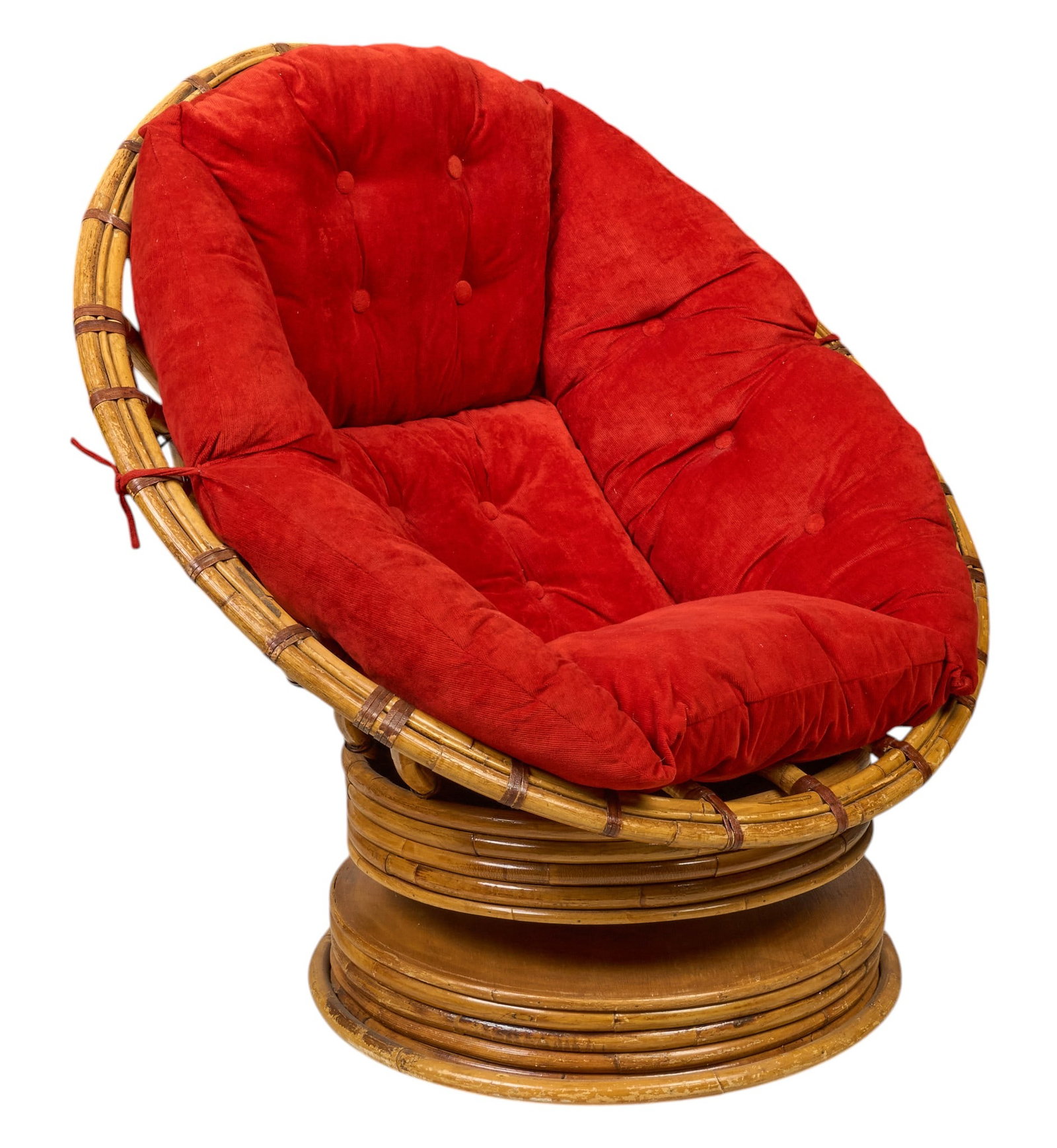 Vintage Bamboo Papasan Chair with Red Upholstery: Vintage bamboo papasan style chair featuring a large tufted button-back cushion in red upholstery, on woven bamboo frame and a swivel base height 40 in. x width 43 in. x depth 39 in.