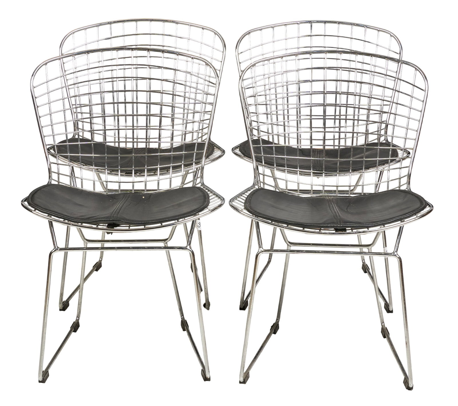 (4) Danish Mid-Century Mesh Chairs: Set of four Danish mid-century steel mesh chairs with black faux leather seats height 31 in. x width 20 in. x depth 17 in. / each 