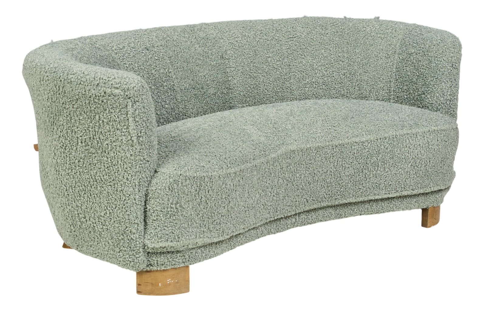 Danish Mid-Century Loveseat: Danish mid-century curved loveseat, upholstered in light green boucle fabric, curved back and integrated arms on block feet height 28 in. x width 68 in. x depth 39 in.