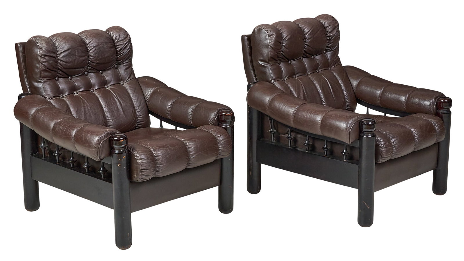 Pair of Danish Mid-Century Lounge Chairs: Pair of Danish mid-century armchairs, with button-tufted brown leather upholstery, padded armrests, and turned legs height 34 in. x width 35 in. x depth 33 in. / each