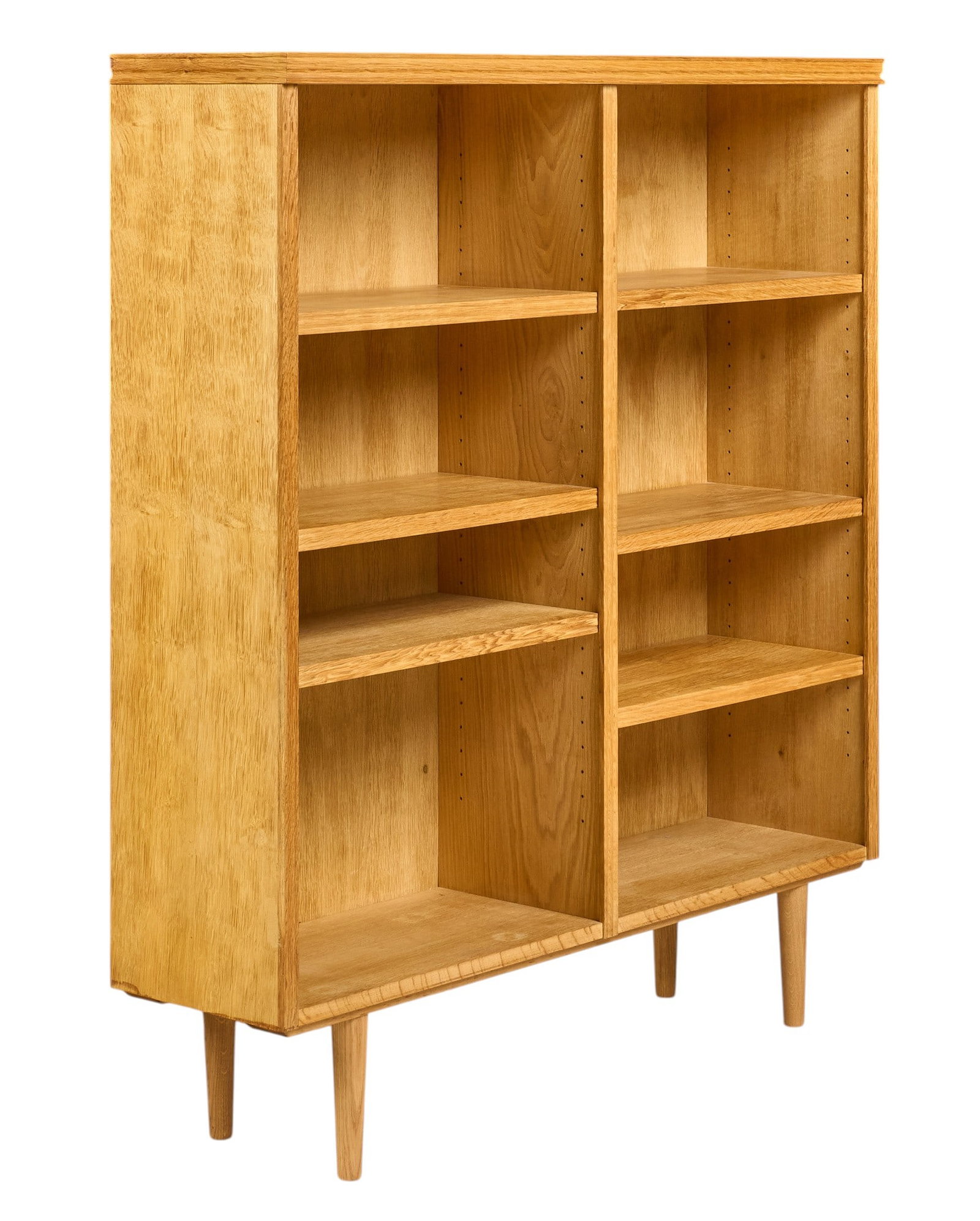 Danish Mid-Century Bookcase: Danish mid-century bookcase with six adjustable shelves, supported on pin legs height 53.5 in. x width 47.5 in. x depth 12.25 in. 