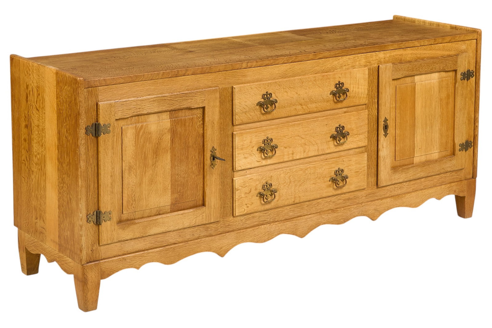 Henning Kjaernulf, Mid-Century Credenza: Henning Kjaernulf (Denmark) mid-century credenza with shelved cabinets, and middle stack of drawers with brass hardware height 27 in. x width 63 in. x depth 17.5 in. Condition: backboard