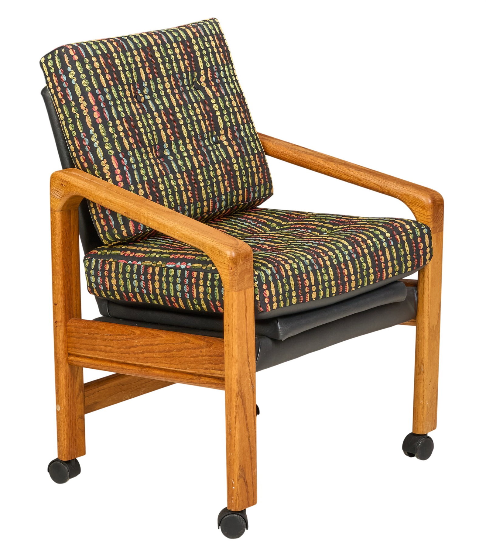 Mid-Century Modern Chair: Reupholstered mid-century modern chair with angular armrests, supported on wheels height 36 in. x width 27 in. x depth 26 in. Provenance: Property from a home in San Antonio, Texas 