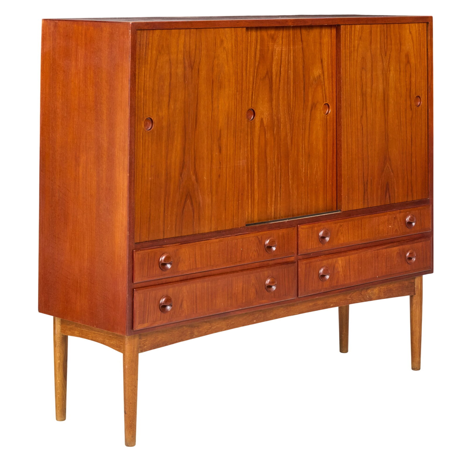 Danish Mid-Century High Credenza: Danish mid-century high credenza with shelved cabinet storage and bottom drawers, supported on pin legs height 47 in. x width 53 in. x depth 17 in. 