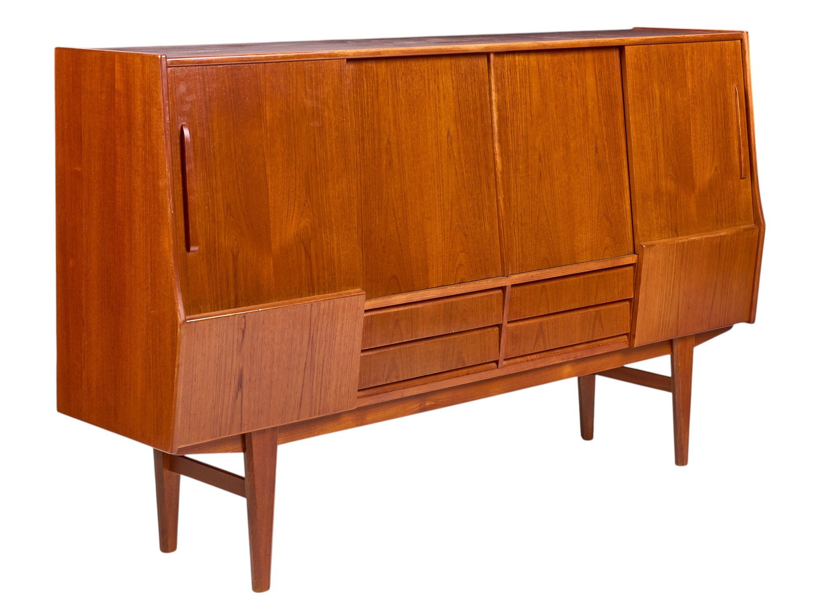 Mid-Century Teak Sideboard: Mid-century teak sideboard, with sliding doors and multiple drawers with green felt lining, supported on tapered pin legs height 47 in. x width 79.5 in. x depth 19 in.
