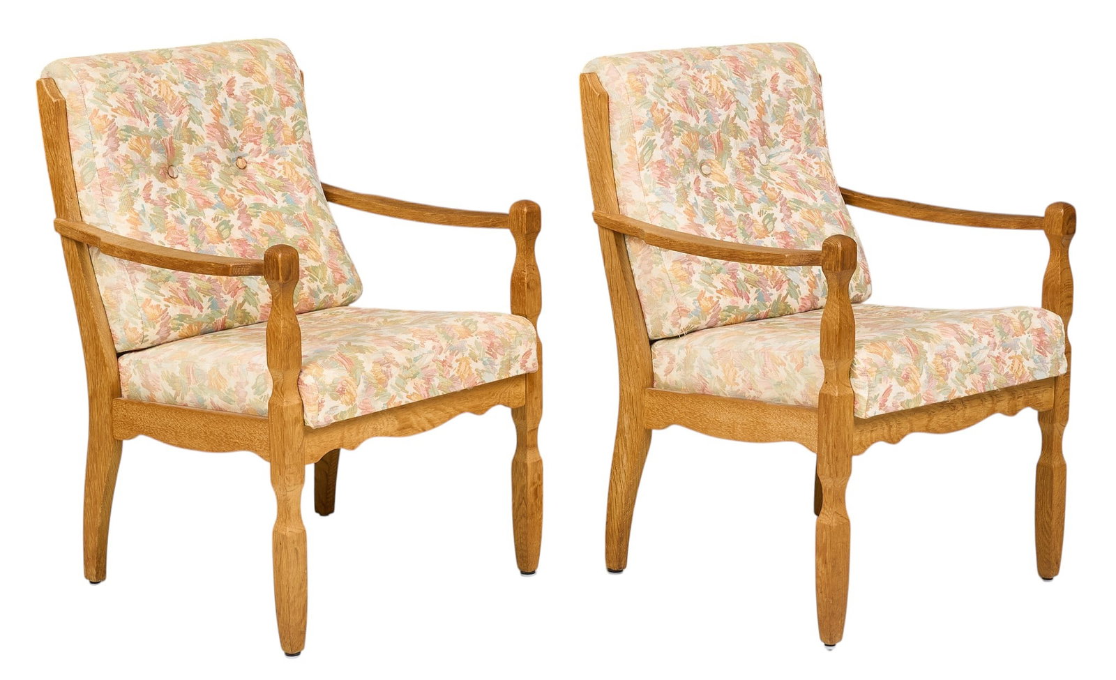 Pair of Danish Armchairs: Pair of Danish mid-century armchairs with button-tufted back, and colorful abstract floral upholstery, supported on shaped legs height 37 in. x width 26 in. x depth 26 in. / each