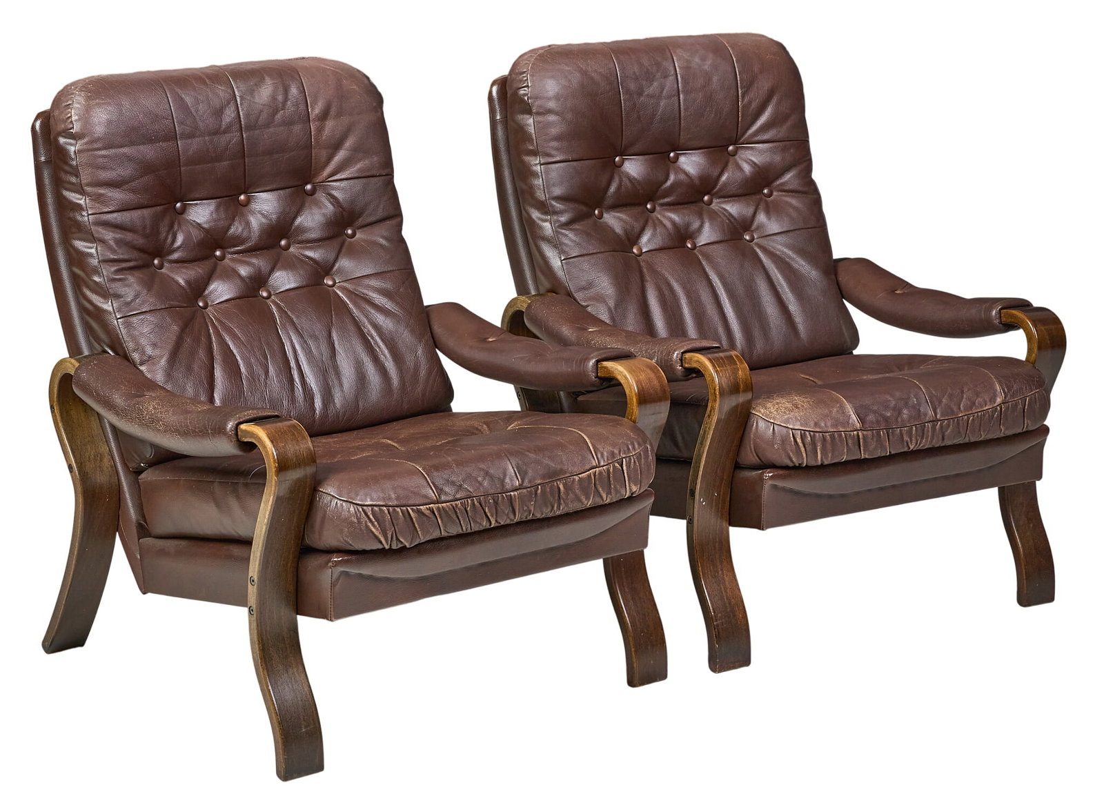 Pair of Danish Mid-Century Lounge Chairs: Pair of Danish mid-century armchairs, with button-tufted brown leather upholstery, padded armrests, and bent wood frames height 35 in. x width 30 in. x depth 34 in. / each