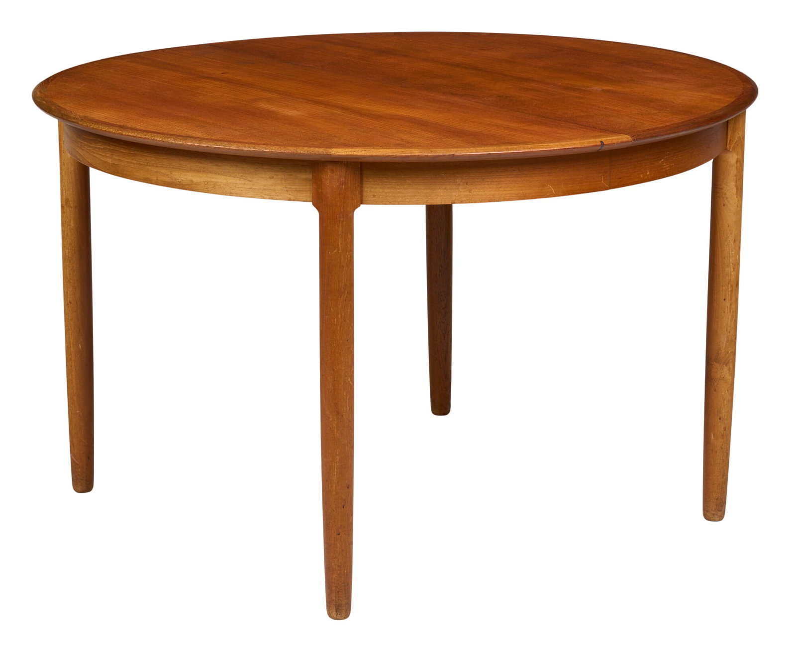 Mid-Century Dining Table: Danish mid-century dining table, with leaves to extend height 29 in. x diameter 47 in. extended / 87 in.