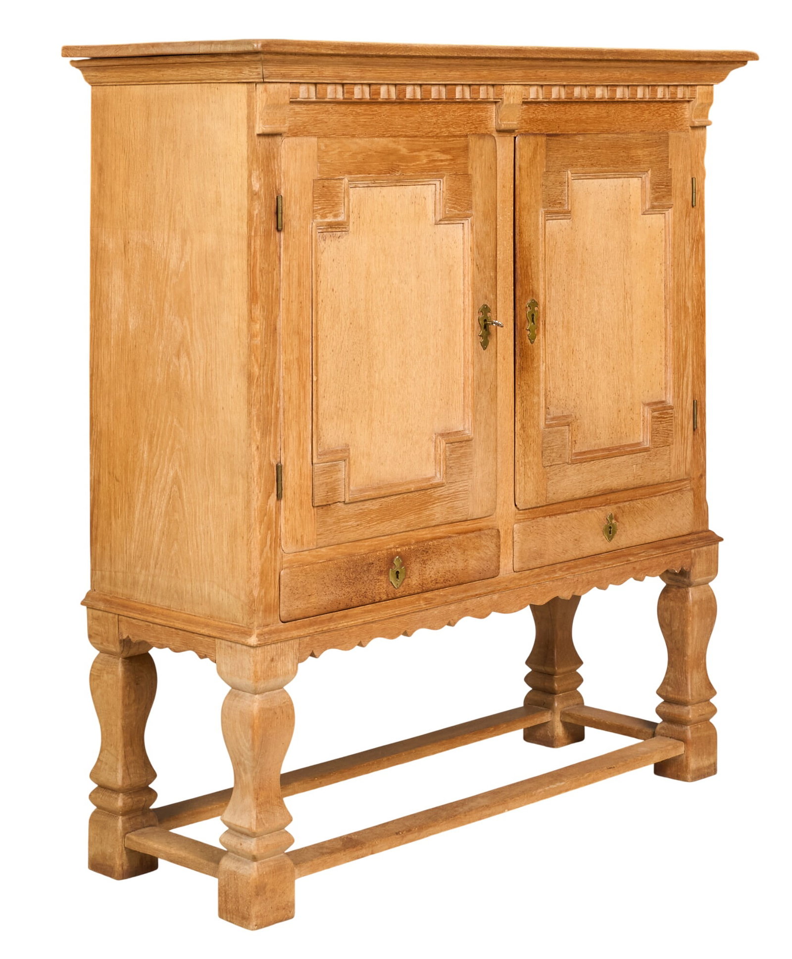 Danish Mid-Century Cabinet: Danish mid-century cabinet with pair of doors with key opening to shelved interior, with bottom drawers, supported on carved legs height 54.5 in. x width 51.5 in. x depth 20 in. 