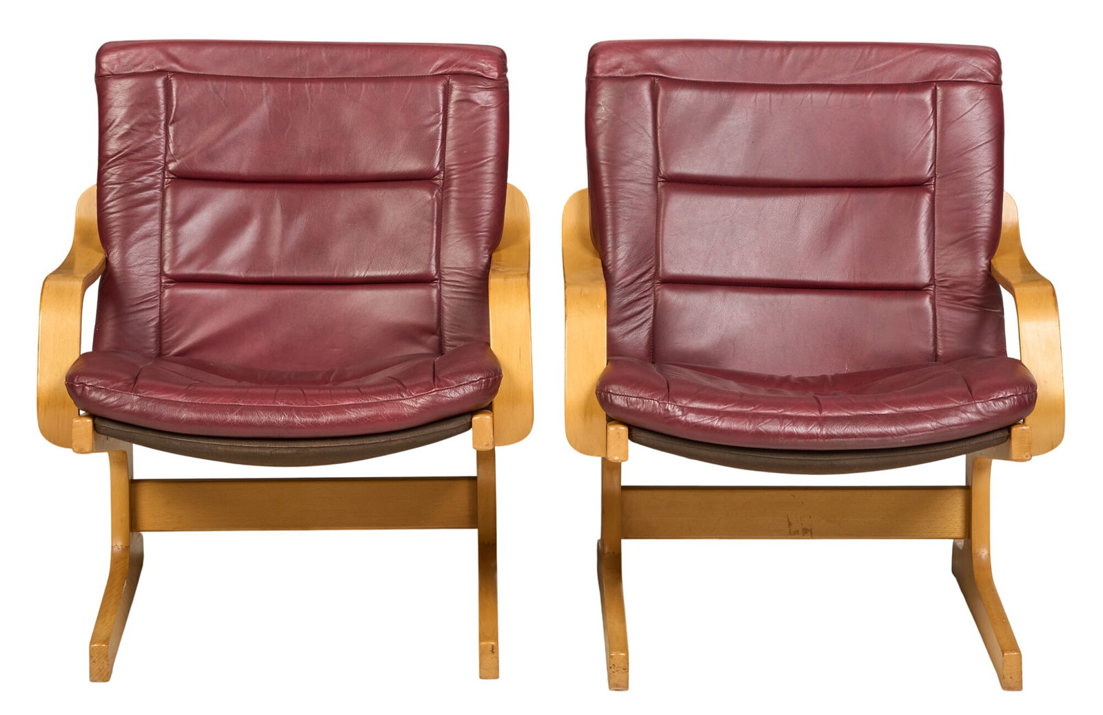 Pair of Danish Mid-Century Lounge Chairs: Pair of Danish mid-century lounge chairs, with tufted red leather upholstery, on bent wood frames height 33 in. x width 28 in. x depth 26 in. / each