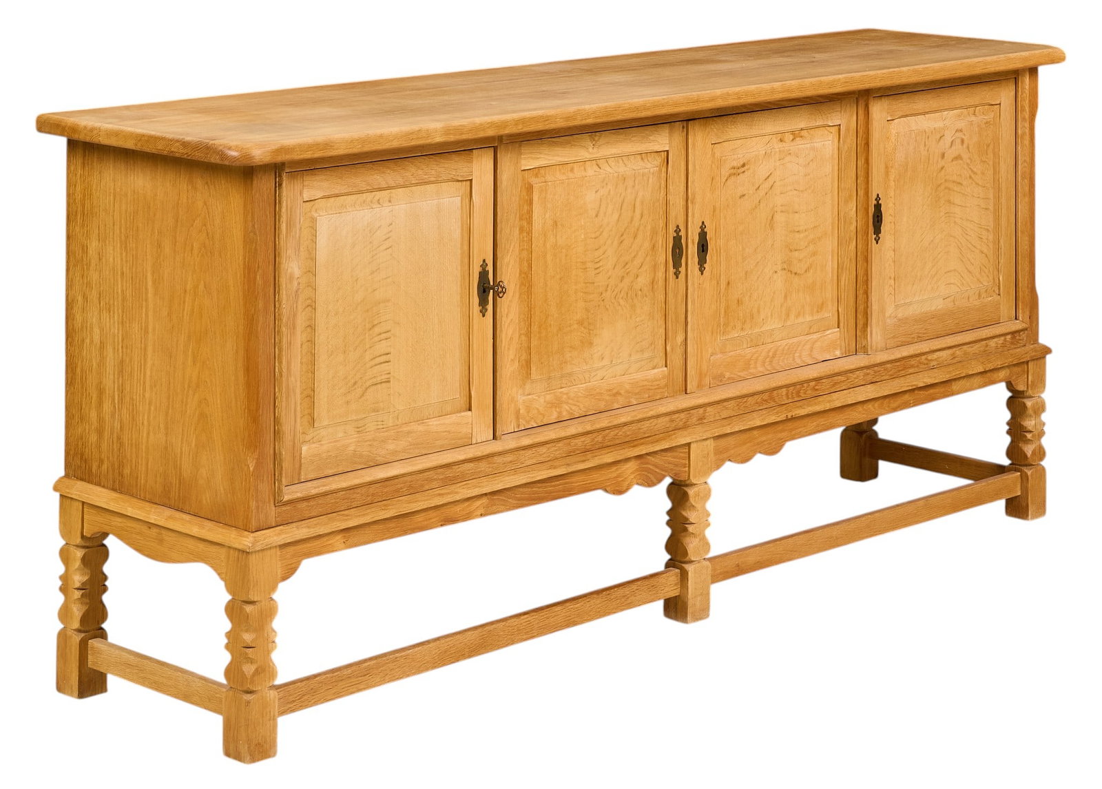 Danish Mid-Century Credenza: Danish mid-century credenza with four cabinets and interior shelving, supported on carved block legs height 34 in. x width 80 in. x depth 19 in. 