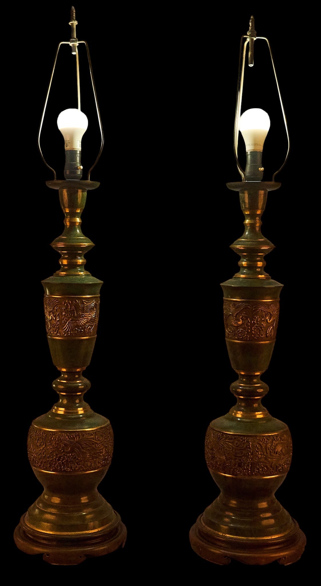 Pair of Vintage Brass Lamps: Pair of vintage brass lamps, with green finish and foliate motifs, circa 1960s height 43 in. x diameter 9 in. / each Provenance: Property from a home in St. Hedwig, Texas