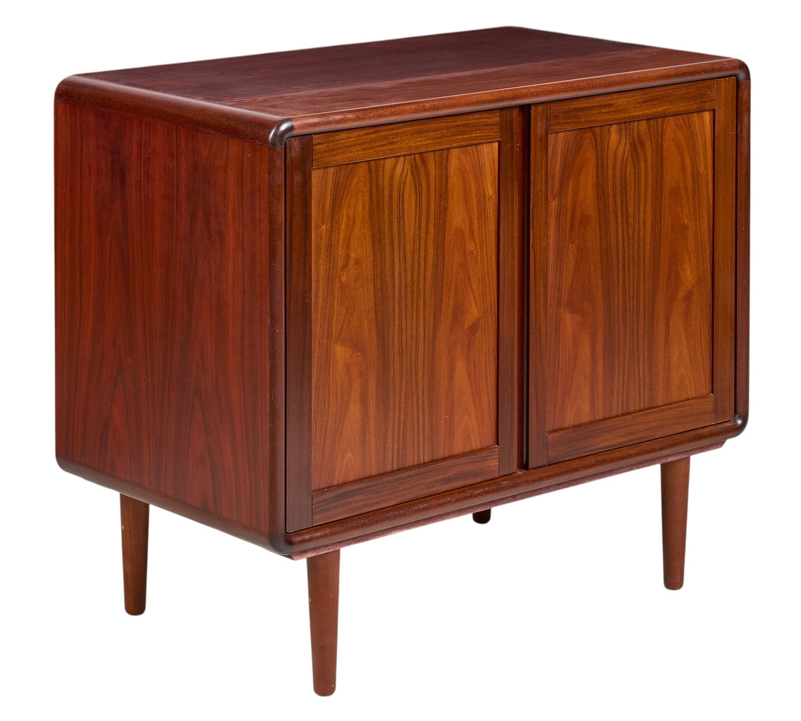 Danish Mid-Century Credenza: Danish mid-century credenza with pair of doors, and single adjustable shelf, supported on pin legs height 30.5 in. x width 35.5 in. x depth 20 in. 