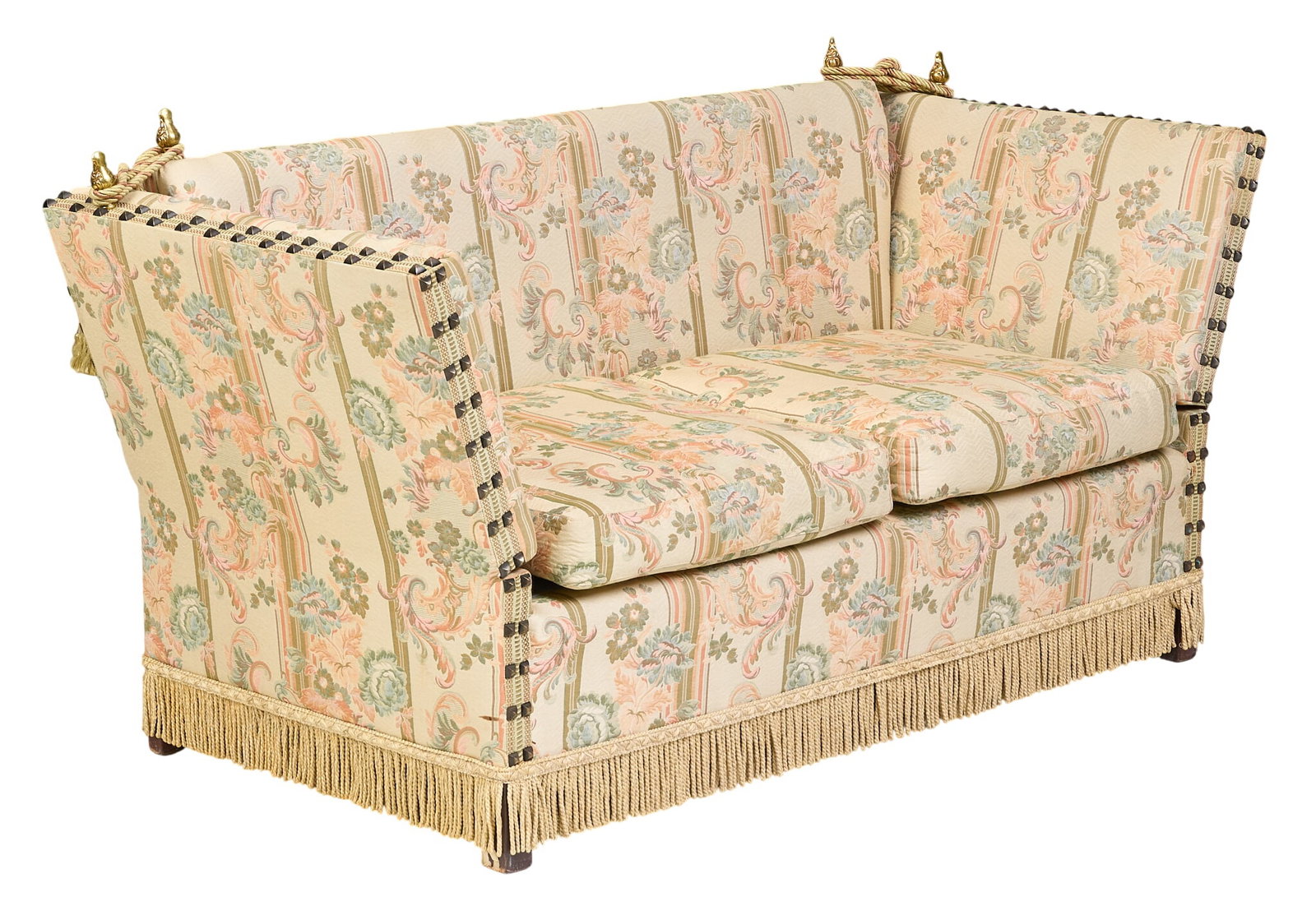 Upholstered Knole Sofa: Knole sofa with floral upholstery and decorative nailhead trim, featuring a fringe skirt and ornate brass finials at the top height 32 in. x width 60 in. x depth 30 in.