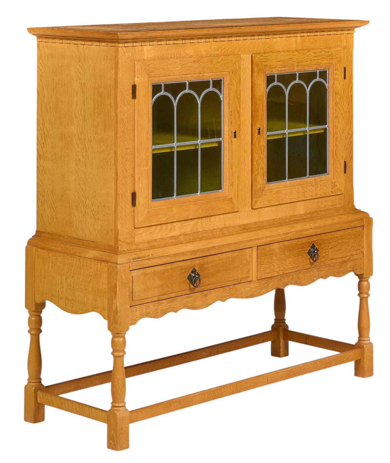 Danish Mid-Century Bookcase: Danish mid-century bookcase with glass doors with leaded arcading, single adjustable shelf, and lower drawer storage, supported on turned legs, with key height 43.5 in. x width 41.25 in. x